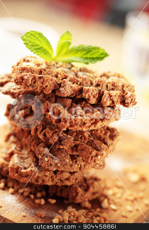 To use this stock image in your creative project, please select the size you need over to the right and click the "Add to Cart" button.
Your downloaded image will come with the Cutcaster watermark removed so don’t worry about the watermark you see on this page. Nut and seed cookies stock photo, Stack of wholegrain nutty cookies - detail by Digifoodstock
