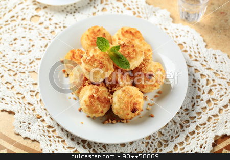 To use this stock image in your creative project, please select the size you need over to the right and click the "Add to Cart" button.
Your downloaded image will come with the Cutcaster watermark removed so don’t worry about the watermark you see on this page. Coconut macaroons stock photo, Stack of coconut macaroons on a plate by Digifoodstock