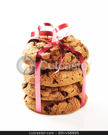 To use this stock image in your creative project, please select the size you need over to the right and click the "Add to Cart" button.
Your downloaded image will come with the Cutcaster watermark removed so don’t worry about the watermark you see on this page. Chocolate chip cookies stock photo, Chocolate chip cookies tied with a red ribbon
by Digifoodstock