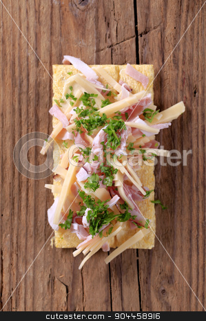 To use this stock image in your creative project, please select the size you need over to the right and click the "Add to Cart" button.
Your downloaded image will come with the Cutcaster watermark removed so don’t worry about the watermark you see on this page. Crispbread with ham and cheese stock photo, Crispbread with ham and cheese - overhead by Digifoodstock