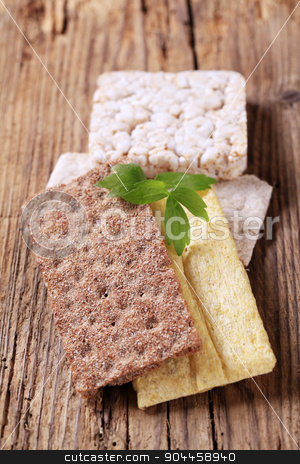 To use this stock image in your creative project, please select the size you need over to the right and click the "Add to Cart" button.
Your downloaded image will come with the Cutcaster watermark removed so don’t worry about the watermark you see on this page. Various types of crisp bread stock photo, Various types of crisp bread on wood by Digifoodstock