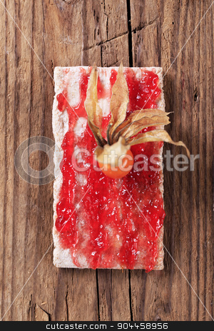 To use this stock image in your creative project, please select the size you need over to the right and click the "Add to Cart" button.
Your downloaded image will come with the Cutcaster watermark removed so don’t worry about the watermark you see on this page. Crispbread with jam stock photo, Slice of crispbread and jam - overhead by Digifoodstock