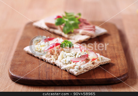 To use this stock image in your creative project, please select the size you need over to the right and click the "Add to Cart" button.
Your downloaded image will come with the Cutcaster watermark removed so don’t worry about the watermark you see on this page. Crispbread with blue cheese and pate stock photo, Crispbread with blue cheese and pate - closeup by Digifoodstock