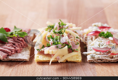 To use this stock image in your creative project, please select the size you need over to the right and click the "Add to Cart" button.
Your downloaded image will come with the Cutcaster watermark removed so don’t worry about the watermark you see on this page. Crispbread with various toppings stock photo, Crispbread with various savory toppings - closeup by Digifoodstock