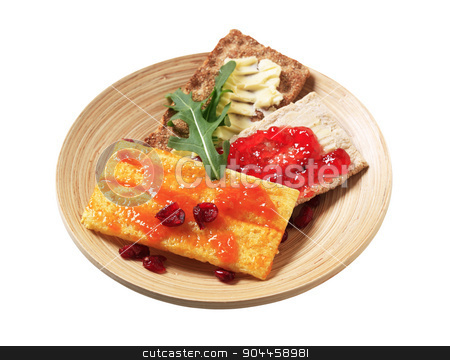 To use this stock image in your creative project, please select the size you need over to the right and click the "Add to Cart" button.
Your downloaded image will come with the Cutcaster watermark removed so don’t worry about the watermark you see on this page. Crispbread with butter and jam stock photo, Crisp bread with butter and jam by Digifoodstock