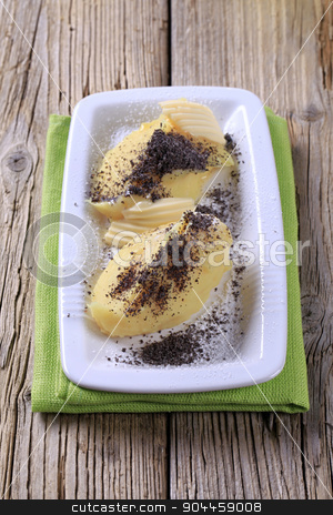 To use this stock image in your creative project, please select the size you need over to the right and click the "Add to Cart" button.
Your downloaded image will come with the Cutcaster watermark removed so don’t worry about the watermark you see on this page. Sweet potato dumplings with poppyseed stock photo, Sweet potato dumplings with poppyseed, sugar and butter by Digifoodstock