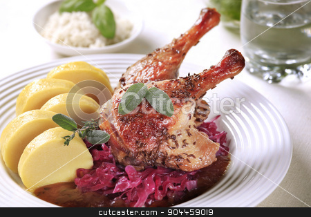 To use this stock image in your creative project, please select the size you need over to the right and click the "Add to Cart" button.
Your downloaded image will come with the Cutcaster watermark removed so don’t worry about the watermark you see on this page. Roast Duck with Red Cabbage and Potato Dumplings stock photo, Roast Duck Legs with Red Cabbage and Potato Dumplings by Digifoodstock