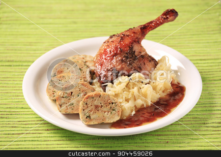To use this stock image in your creative project, please select the size you need over to the right and click the "Add to Cart" button.
Your downloaded image will come with the Cutcaster watermark removed so don’t worry about the watermark you see on this page. Roast Duck Leg with Cabbage and Bread Dumplings stock photo, Roast Duck with Cabbage and Bread Dumplings - Czech cuisine by Digifoodstock