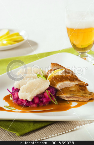 To use this stock image in your creative project, please select the size you need over to the right and click the "Add to Cart" button.
Your downloaded image will come with the Cutcaster watermark removed so don’t worry about the watermark you see on this page. Roast Duck, Red Cabbage and Dumplings stock photo, Crispy Roast Duck, Red Cabbage and Dumplings by Digifoodstock
