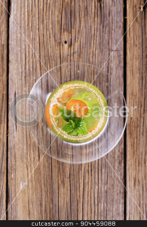 To use this stock image in your creative project, please select the size you need over to the right and click the "Add to Cart" button.
Your downloaded image will come with the Cutcaster watermark removed so don’t worry about the watermark you see on this page. Cocktail drink stock photo, Glass of chilled cocktail drink - overhead by Digifoodstock