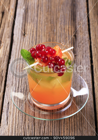 To use this stock image in your creative project, please select the size you need over to the right and click the "Add to Cart" button.
Your downloaded image will come with the Cutcaster watermark removed so don’t worry about the watermark you see on this page. Glass of iced drink stock photo, Glass of iced drink garnished with fresh fruit by Digifoodstock