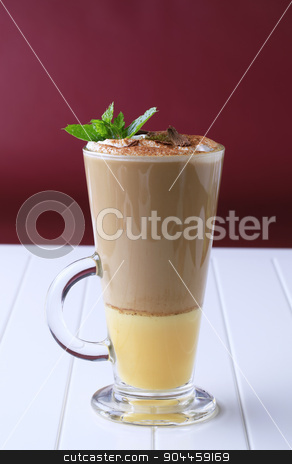 To use this stock image in your creative project, please select the size you need over to the right and click the "Add to Cart" button.
Your downloaded image will come with the Cutcaster watermark removed so don’t worry about the watermark you see on this page. Liqueur coffee stock photo, Coffee drink with a shot of eggnog by Digifoodstock