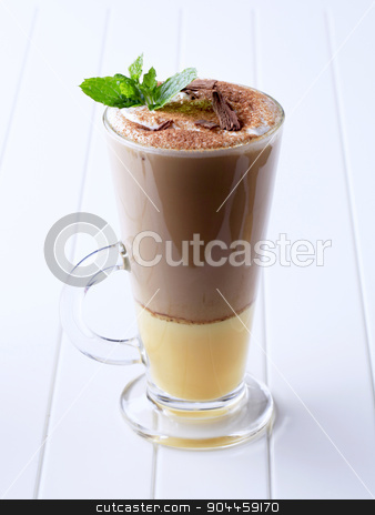To use this stock image in your creative project, please select the size you need over to the right and click the "Add to Cart" button.
Your downloaded image will come with the Cutcaster watermark removed so don’t worry about the watermark you see on this page. Liqueur coffee stock photo, Coffee drink with a shot of eggnog by Digifoodstock