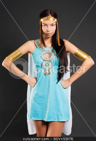 To use this stock image in your creative project, please select the size you need over to the right and click the "Add to Cart" button.
Your downloaded image will come with the Cutcaster watermark removed so don’t worry about the watermark you see on this page. Pretty girl in Cleopatra role stock photo, Beautiful woman in egyptian queen costume at black background by Aikon