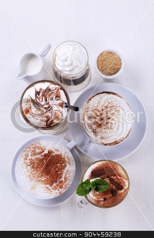 To use this stock image in your creative project, please select the size you need over to the right and click the "Add to Cart" button.
Your downloaded image will come with the Cutcaster watermark removed so don’t worry about the watermark you see on this page. Coffee drinks stock photo, Variety of coffee and chocolate drinks - overhead by Digifoodstock