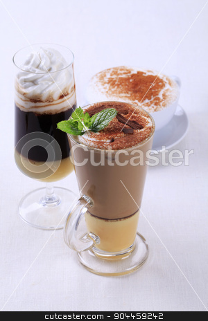 To use this stock image in your creative project, please select the size you need over to the right and click the "Add to Cart" button.
Your downloaded image will come with the Cutcaster watermark removed so don’t worry about the watermark you see on this page. Coffee drinks stock photo, Coffee and chocolate drinks - still life by Digifoodstock