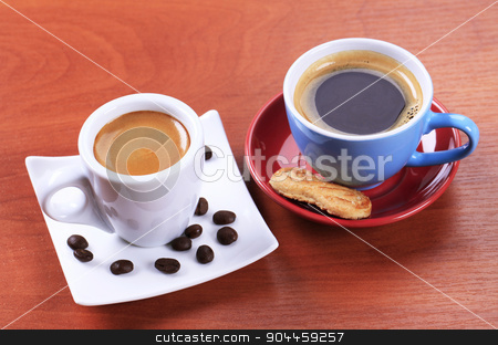 To use this stock image in your creative project, please select the size you need over to the right and click the "Add to Cart" button.
Your downloaded image will come with the Cutcaster watermark removed so don’t worry about the watermark you see on this page. Coffee drinks stock photo, Two cups of coffee by Digifoodstock