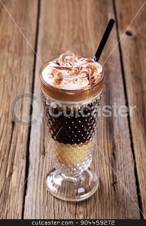 To use this stock image in your creative project, please select the size you need over to the right and click the "Add to Cart" button.
Your downloaded image will come with the Cutcaster watermark removed so don’t worry about the watermark you see on this page. Coffee drink stock photo, Coffee drink topped with whipped cream and mutmeg by Digifoodstock