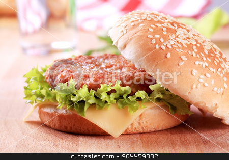To use this stock image in your creative project, please select the size you need over to the right and click the "Add to Cart" button.
Your downloaded image will come with the Cutcaster watermark removed so don’t worry about the watermark you see on this page. Cheeseburger stock photo, Closeup of a Cheeseburger - ready to eat by Digifoodstock