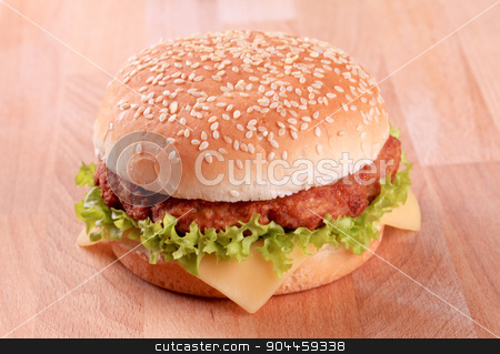 To use this stock image in your creative project, please select the size you need over to the right and click the "Add to Cart" button.
Your downloaded image will come with the Cutcaster watermark removed so don’t worry about the watermark you see on this page. Cheeseburger stock photo, Closeup of a Cheeseburger by Digifoodstock