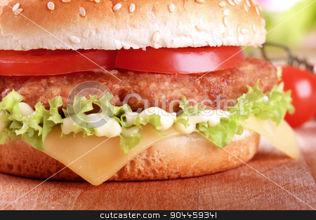 To use this stock image in your creative project, please select the size you need over to the right and click the "Add to Cart" button.
Your downloaded image will come with the Cutcaster watermark removed so don’t worry about the watermark you see on this page. Cheeseburger stock photo, Detail of a Cheeseburger - ready to eat by Digifoodstock