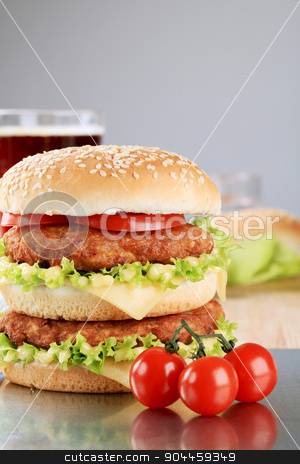 To use this stock image in your creative project, please select the size you need over to the right and click the "Add to Cart" button.
Your downloaded image will come with the Cutcaster watermark removed so don’t worry about the watermark you see on this page. Double cheeseburger stock photo, Appetizing double cheeseburger - ready to eat by Digifoodstock