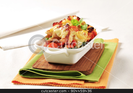 To use this stock image in your creative project, please select the size you need over to the right and click the "Add to Cart" button.
Your downloaded image will come with the Cutcaster watermark removed so don’t worry about the watermark you see on this page. Fish and vegetable casserole stock photo, Fish and vegetable casserole topped with cheese by Digifoodstock