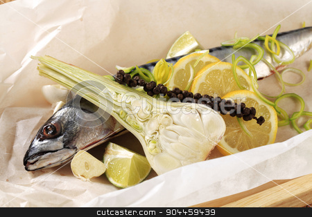 To use this stock image in your creative project, please select the size you need over to the right and click the "Add to Cart" button.
Your downloaded image will come with the Cutcaster watermark removed so don’t worry about the watermark you see on this page. Fresh mackerel stock photo, Fresh mackerel and other ingredients on paper by Digifoodstock