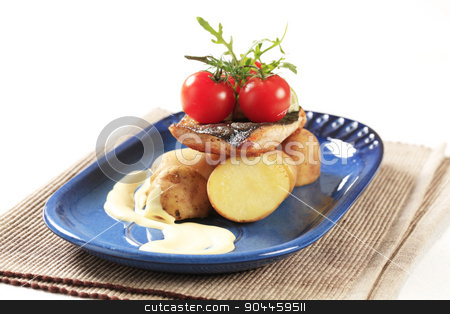 To use this stock image in your creative project, please select the size you need over to the right and click the "Add to Cart" button.
Your downloaded image will come with the Cutcaster watermark removed so don’t worry about the watermark you see on this page. Pan fried fish with new potatoes stock photo, Pan fried fish served with new potatoes by Digifoodstock