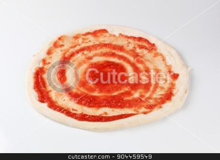 To use this stock image in your creative project, please select the size you need over to the right and click the "Add to Cart" button.
Your downloaded image will come with the Cutcaster watermark removed so don’t worry about the watermark you see on this page. Pizza dough and tomato paste stock photo, Tomato paste spread on raw pizza dough by Digifoodstock