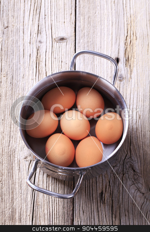 To use this stock image in your creative project, please select the size you need over to the right and click the "Add to Cart" button.
Your downloaded image will come with the Cutcaster watermark removed so don’t worry about the watermark you see on this page. Brown eggs in a pan stock photo, Brown eggs in water in a pan by Digifoodstock