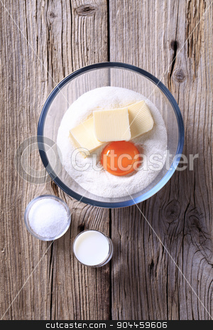 To use this stock image in your creative project, please select the size you need over to the right and click the "Add to Cart" button.
Your downloaded image will come with the Cutcaster watermark removed so don’t worry about the watermark you see on this page. Ingredients to prepare pastry dough stock photo, Bowl of flour, egg yolk and butter by Digifoodstock