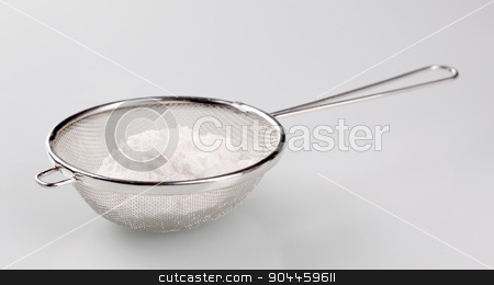To use this stock image in your creative project, please select the size you need over to the right and click the "Add to Cart" button.
Your downloaded image will come with the Cutcaster watermark removed so don’t worry about the watermark you see on this page. Sieve and sugar stock photo, Heap of powdered sugar in a sieve by Digifoodstock