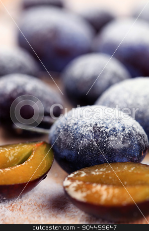 To use this stock image in your creative project, please select the size you need over to the right and click the "Add to Cart" button.
Your downloaded image will come with the Cutcaster watermark removed so don’t worry about the watermark you see on this page. Ripe plums stock photo, Ripe plums sprinkled with powdered sugar - detail by Digifoodstock