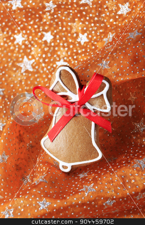 To use this stock image in your creative project, please select the size you need over to the right and click the "Add to Cart" button.
Your downloaded image will come with the Cutcaster watermark removed so don’t worry about the watermark you see on this page. Gingerbread cookie stock photo, Gingerbread cookie on a festive organza tablecloth by Digifoodstock