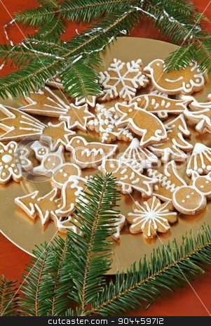 To use this stock image in your creative project, please select the size you need over to the right and click the "Add to Cart" button.
Your downloaded image will come with the Cutcaster watermark removed so don’t worry about the watermark you see on this page. Christmas Gingerbread Cookies stock photo, Christmas gingerbread cookies on a golden plate by Digifoodstock