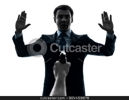 To use this stock image in your creative project, please select the size you need over to the right and click the "Add to Cart" button.
Your downloaded image will come with the Cutcaster watermark removed so don’t worry about the watermark you see on this page. business man arms raised with gun pointing at him silhouette stock photo, one businessman arms raised with gun pointing at him in silhouette studio isolated on white background by Ishadow