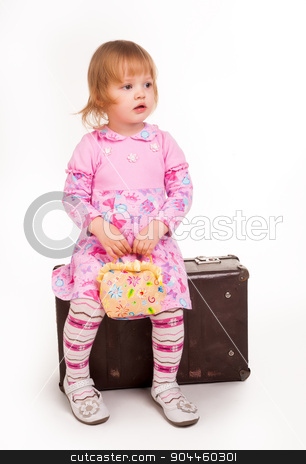 To use this stock image in your creative project, please select the size you need over to the right and click the "Add to Cart" button.
Your downloaded image will come with the Cutcaster watermark removed so don’t worry about the watermark you see on this page. portrait of adorable young girl on old suitcase stock photo, Full length portrait of a little 2 years old girl sitting on suitcase at white background by Aikon