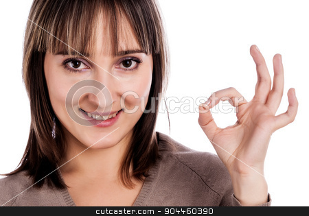 To use this stock image in your creative project, please select the size you need over to the right and click the "Add to Cart" button.
Your downloaded image will come with the Cutcaster watermark removed so don’t worry about the watermark you see on this page. Woman showing okay gesture stock photo, Attractive woman showing the ok sign over white background by Aikon
