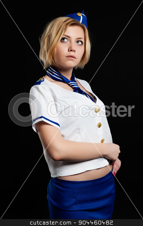 To use this stock image in your creative project, please select the size you need over to the right and click the "Add to Cart" button.
Your downloaded image will come with the Cutcaster watermark removed so don’t worry about the watermark you see on this page. Young beautiful air hostess stock photo, Attractive young playful stewardess over black background by Aikon