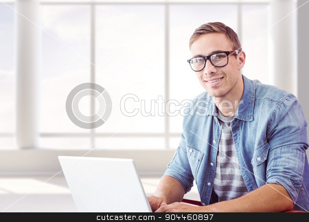 To use this stock image in your creative project, please select the size you need over to the right and click the "Add to Cart" button.
Your downloaded image will come with the Cutcaster watermark removed so don’t worry about the watermark you see on this page. Composite image of hipster on laptop stock photo, Hipster on laptop against room with large window by Wavebreak Media