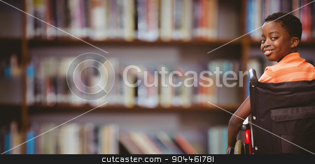 To use this stock image in your creative project, please select the size you need over to the right and click the "Add to Cart" button.
Your downloaded image will come with the Cutcaster watermark removed so don’t worry about the watermark you see on this page. Composite image of portrait of cute boy sitting in wheelchair stock photo, Portrait of cute boy sitting in wheelchair against library shelf by Wavebreak Media