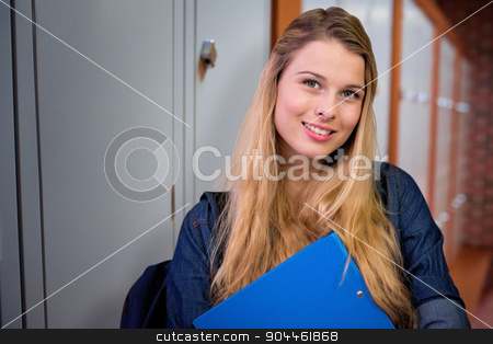 To use this stock image in your creative project, please select the size you need over to the right and click the "Add to Cart" button.
Your downloaded image will come with the Cutcaster watermark removed so don’t worry about the watermark you see on this page. Composite image of pretty student in the library stock photo, Pretty student in the library against closed lockers in a row at the college by Wavebreak Media