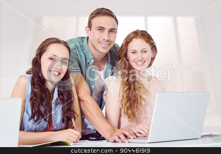 To use this stock image in your creative project, please select the size you need over to the right and click the "Add to Cart" button.
Your downloaded image will come with the Cutcaster watermark removed so don’t worry about the watermark you see on this page. Composite image of fashion students using laptop stock photo, Fashion students using laptop against bright white room with windows by Wavebreak Media