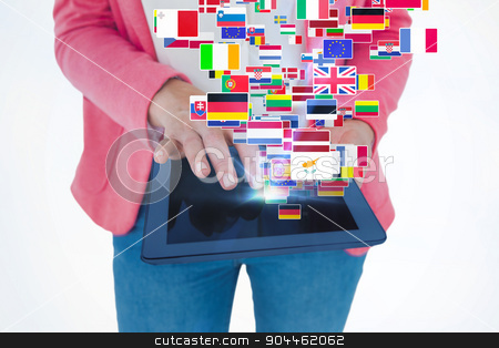 To use this stock image in your creative project, please select the size you need over to the right and click the "Add to Cart" button.
Your downloaded image will come with the Cutcaster watermark removed so don’t worry about the watermark you see on this page. Composite image of elegant brunette using tablet stock photo, Elegant brunette using tablet against international flags by Wavebreak Media