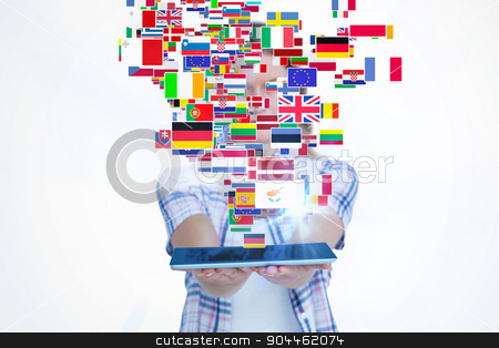To use this stock image in your creative project, please select the size you need over to the right and click the "Add to Cart" button.
Your downloaded image will come with the Cutcaster watermark removed so don’t worry about the watermark you see on this page. Composite image of pretty hipster showing tablet stock photo, Pretty hipster showing tablet against international flags by Wavebreak Media