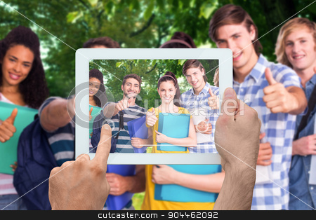 To use this stock image in your creative project, please select the size you need over to the right and click the "Add to Cart" button.
Your downloaded image will come with the Cutcaster watermark removed so don’t worry about the watermark you see on this page. Composite image of hand holding tablet pc stock photo, Hand holding tablet pc against park by Wavebreak Media