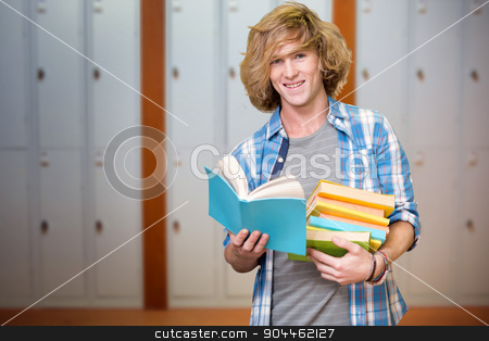To use this stock image in your creative project, please select the size you need over to the right and click the "Add to Cart" button.
Your downloaded image will come with the Cutcaster watermark removed so don’t worry about the watermark you see on this page. Composite image of student reading book stock photo, Student reading book against closed lockers in a row at the college by Wavebreak Media