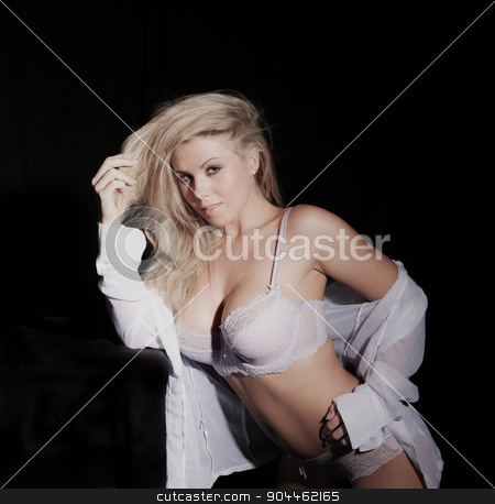 To use this stock image in your creative project, please select the size you need over to the right and click the "Add to Cart" button.
Your downloaded image will come with the Cutcaster watermark removed so don’t worry about the watermark you see on this page. sexy woman in shirt and underwear stock photo, sexy woman in shirt and underwear on black background by sijohnsen