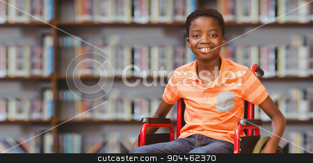 To use this stock image in your creative project, please select the size you need over to the right and click the "Add to Cart" button.
Your downloaded image will come with the Cutcaster watermark removed so don’t worry about the watermark you see on this page. Composite image of portrait of boy sitting in wheelchair at libr stock photo, Portrait of boy sitting in wheelchair at library against library shelf by Wavebreak Media